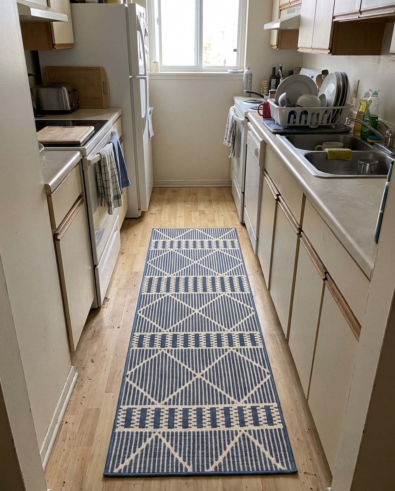 2' x 6' Lomax · Geometric diamond Outdoor Rug, blue and ivory