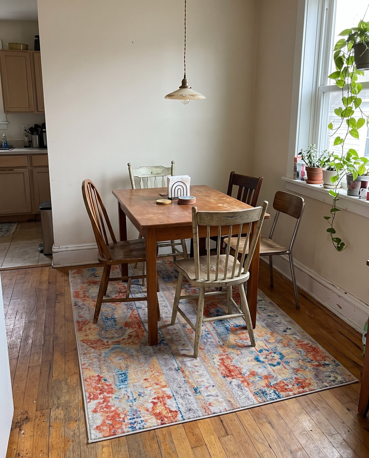 4' x 6' Amos · Distressed medallion rug, orange and blue