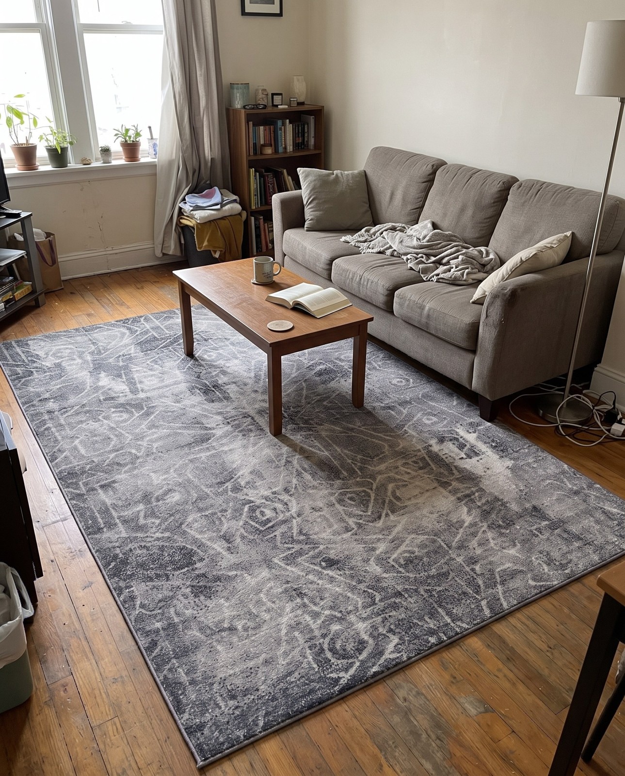 Detail image of 3' x 5' 3 Blakemore · Distressed medallion rug, gray and ivory