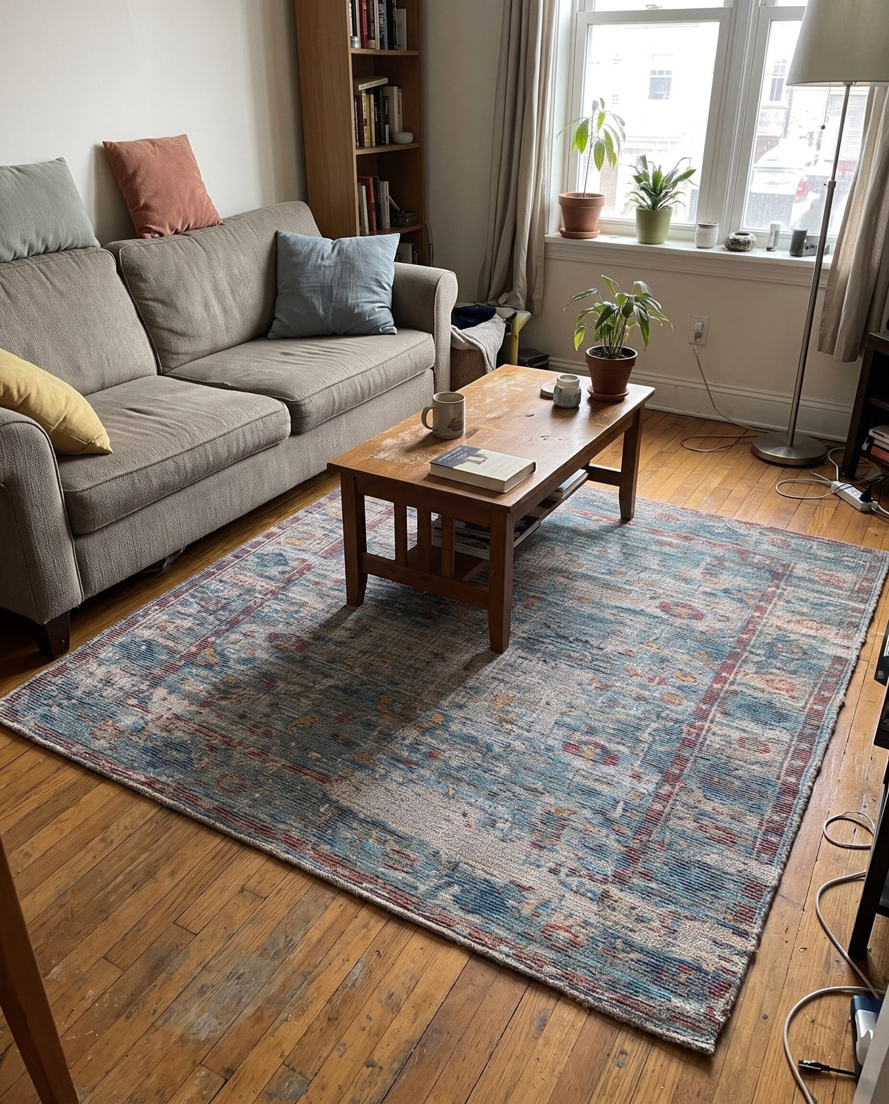 7' 10 x 7' 10 Biloxi · Distressed medallion rug, teal and terracotta