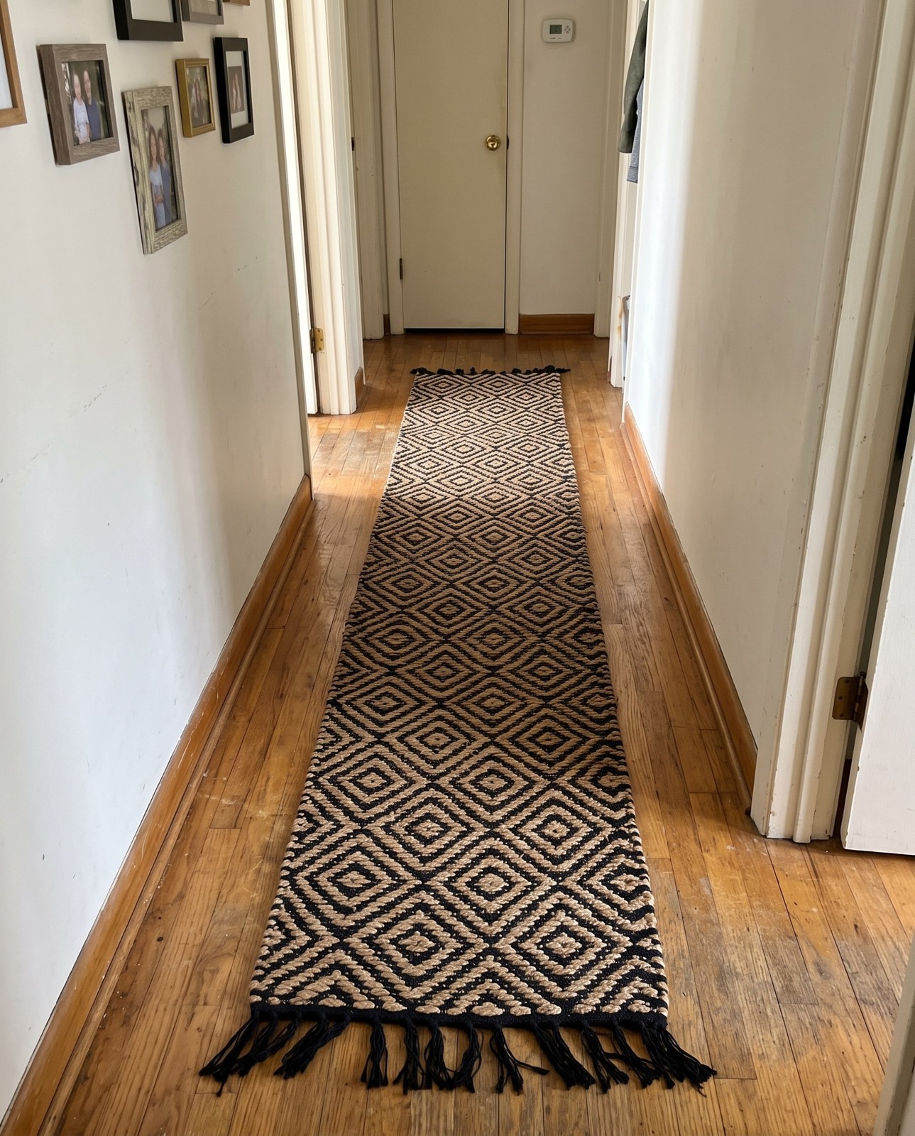 Detail image of 0' 9 x 2' 6 Holland · Diamond Braided Jute Rug, black