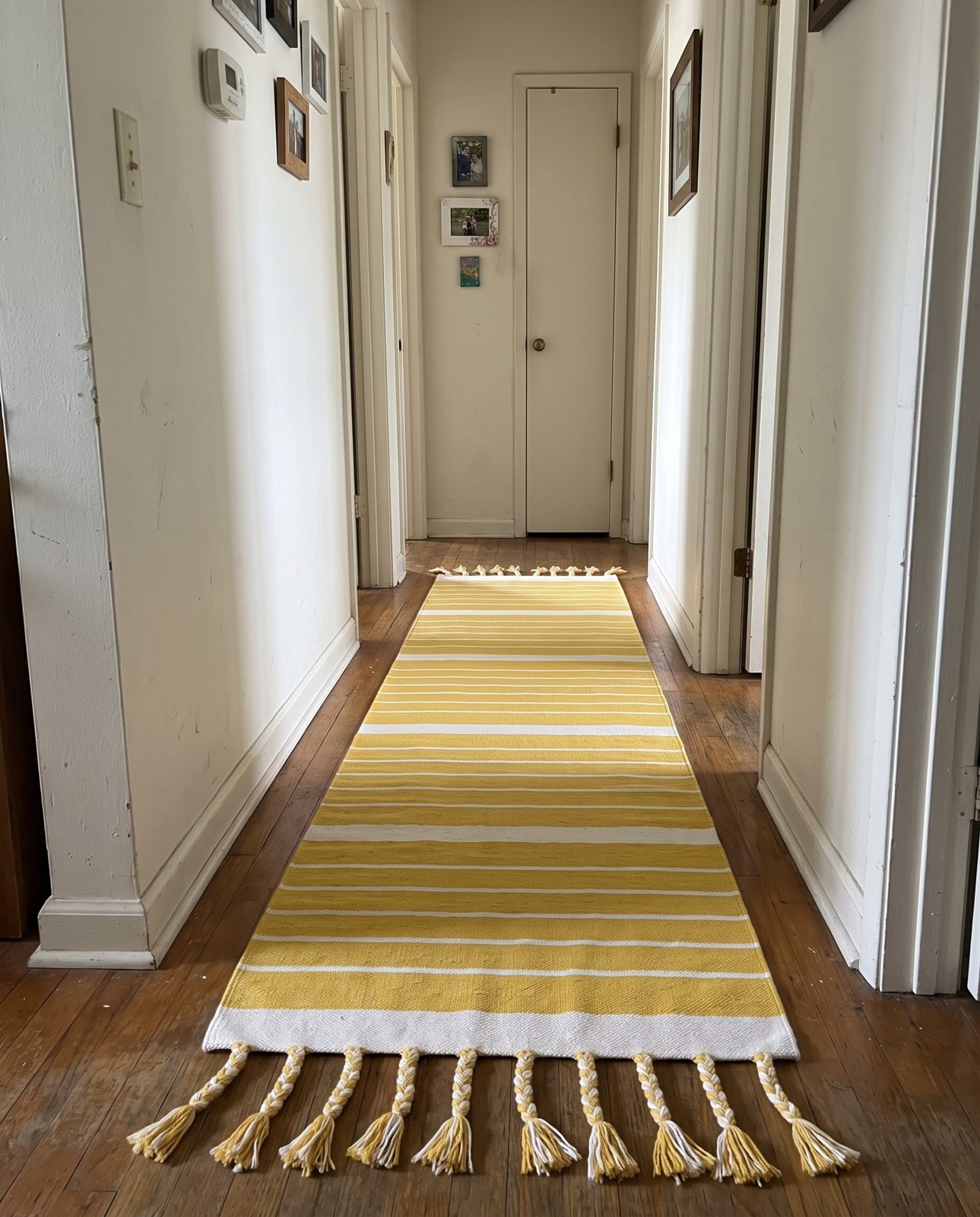 2' 7 x 10' Ottley · Striped Chindi Rug, yellow and white