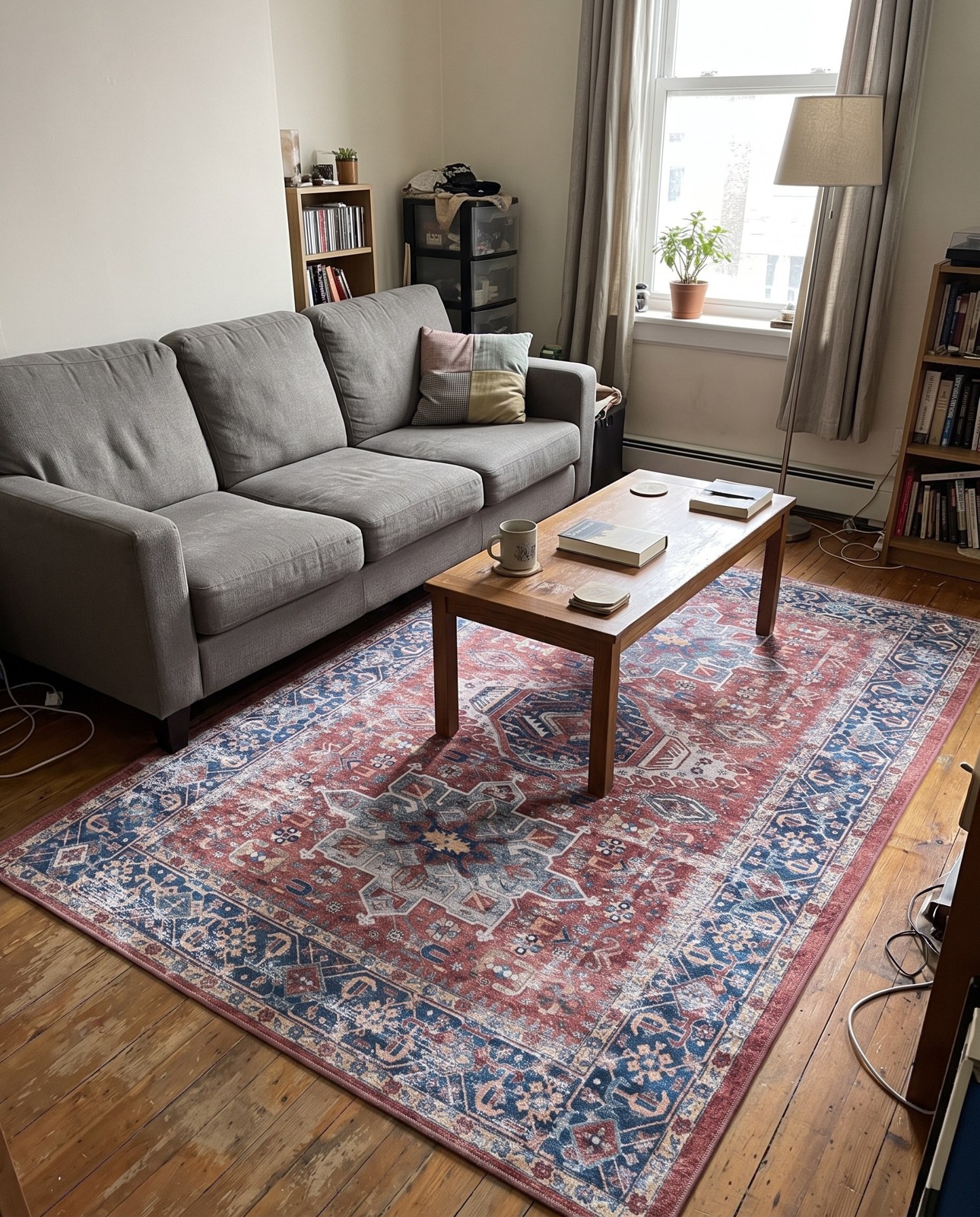 6' x 9' Tatlock · Distressed medallion Washable Rug, rust and blue