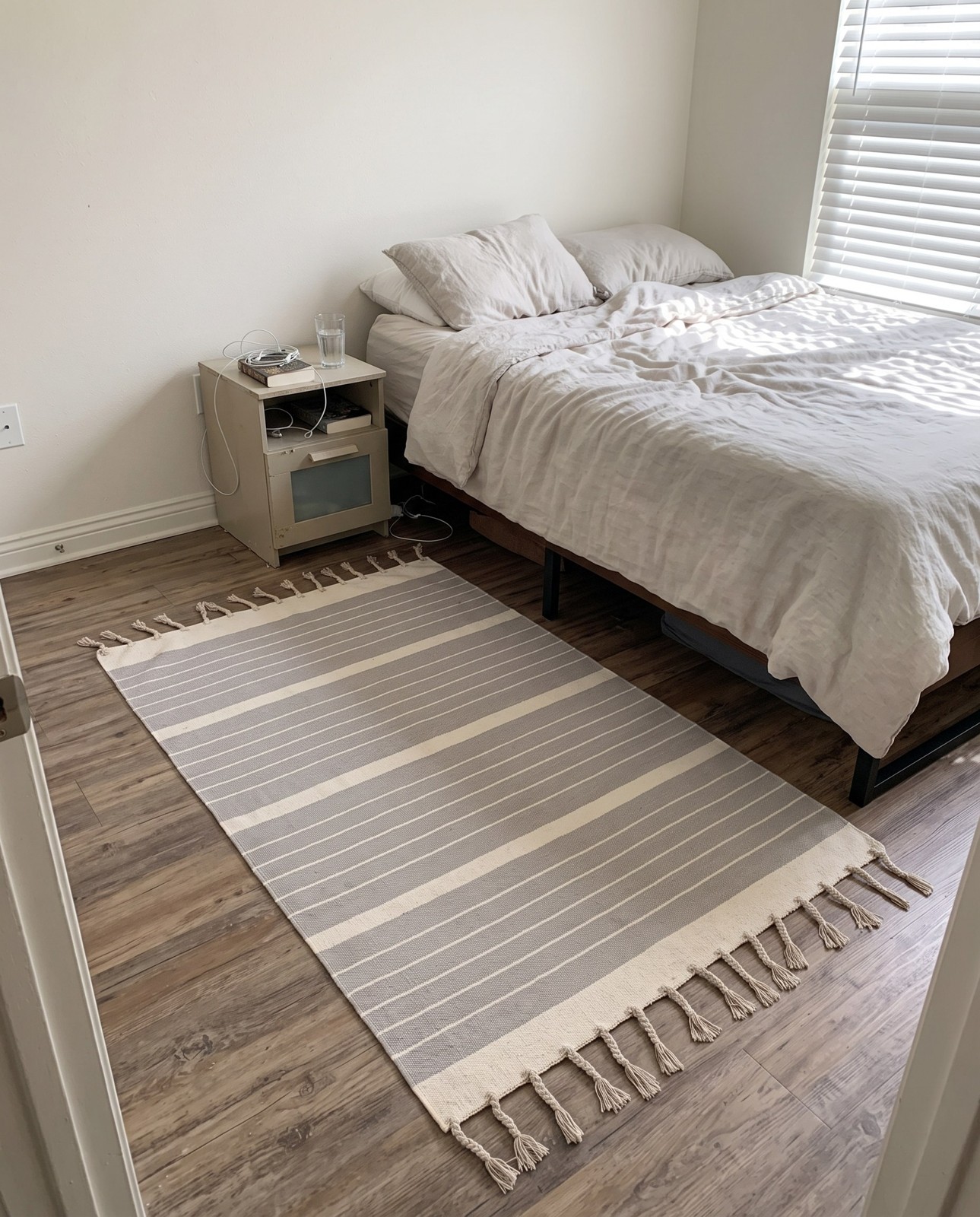 Detail image of 4' 1 x 6' 1 Ottley · Striped Chindi Rug, gray and cream
