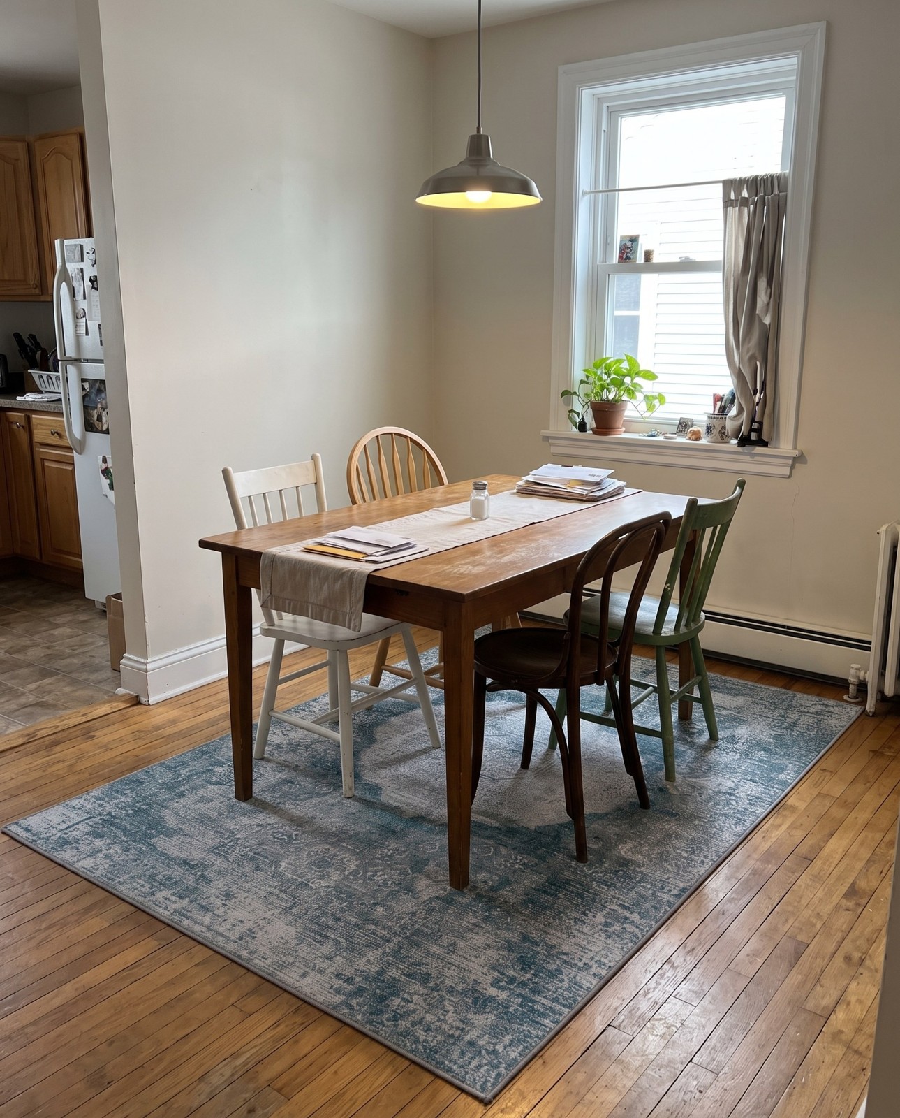 Detail image of 4' x 6' Fallowfield · Distressed medallion Washable Rug, teal and ivory