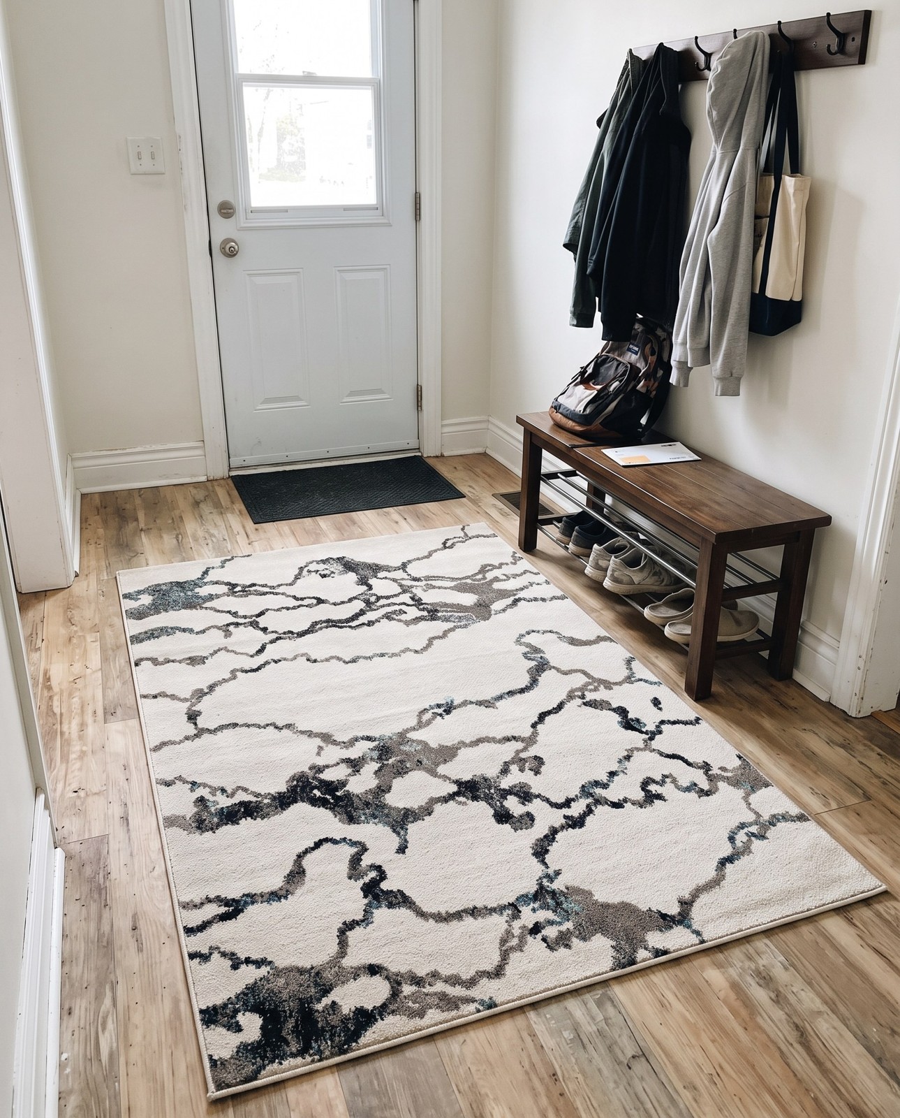 2' x 3' Irwin · Abstract rug, ivory