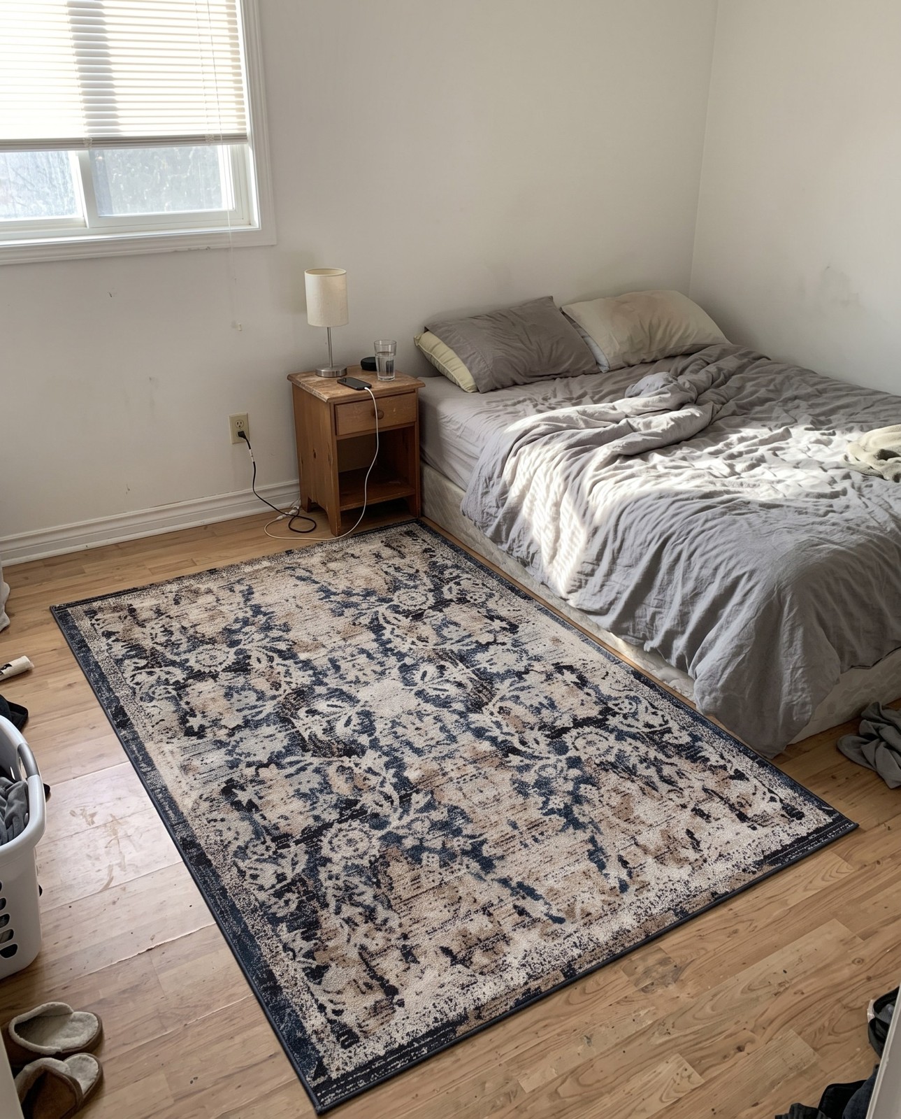 5' 3 x 8' Lumley · Distressed floral rug, navy and beige