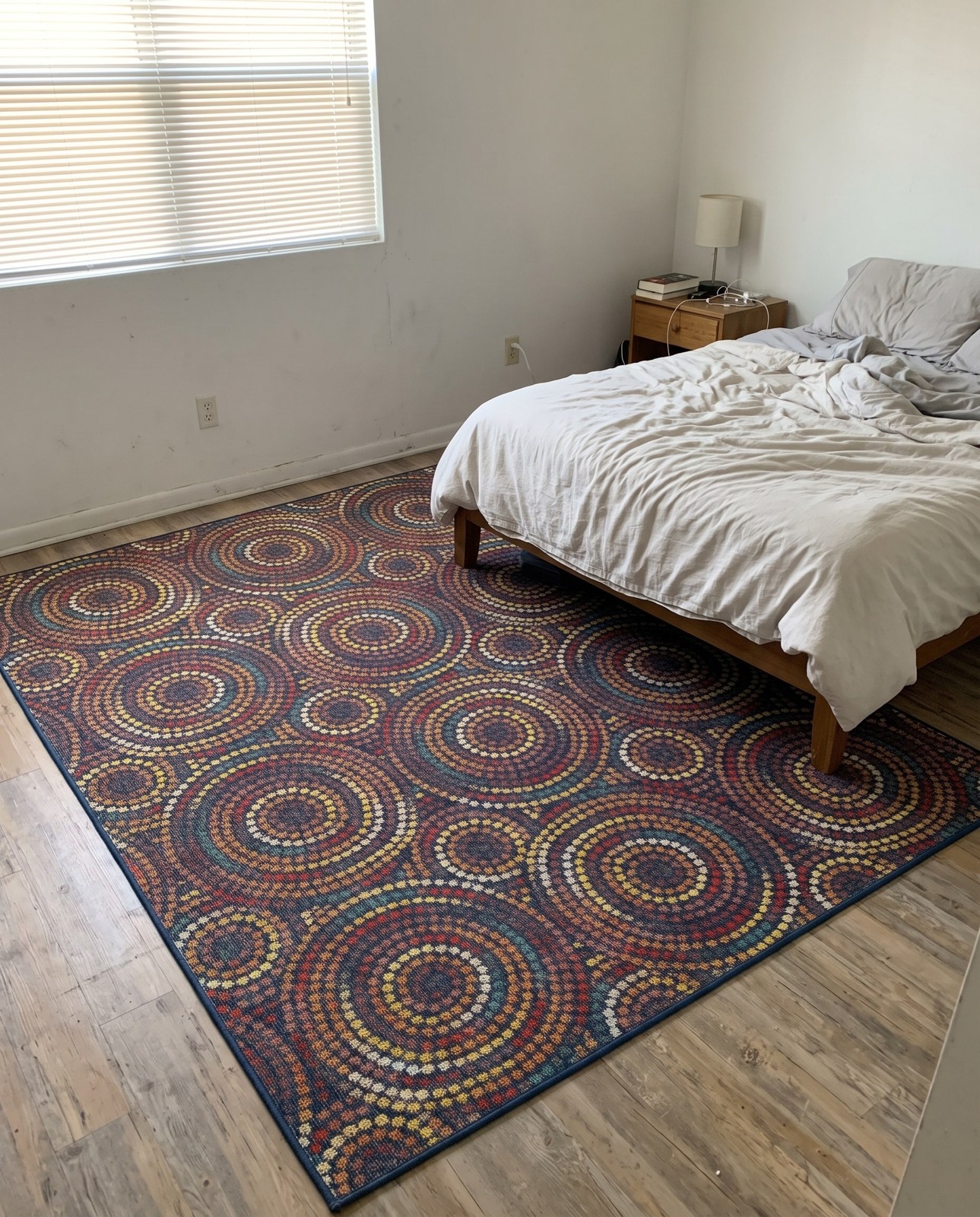 9' x 12' Wimberly · Concentric dotted rings Outdoor Rug, multicolor