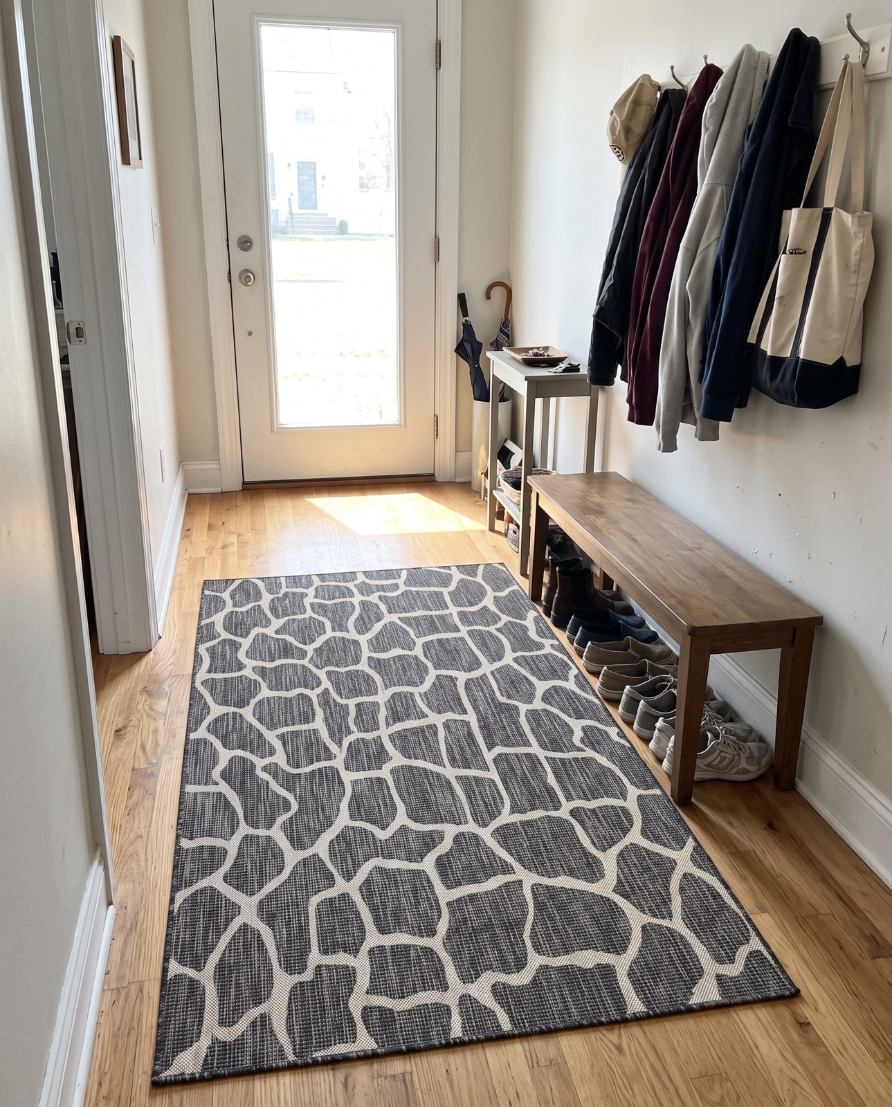 9' x 12' Stillwater · Animal print Outdoor Rug, charcoal