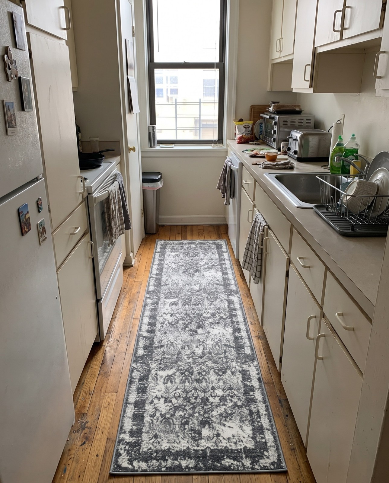 2' 7 x 10' Pike · Distressed medallion rug, gray and ivory