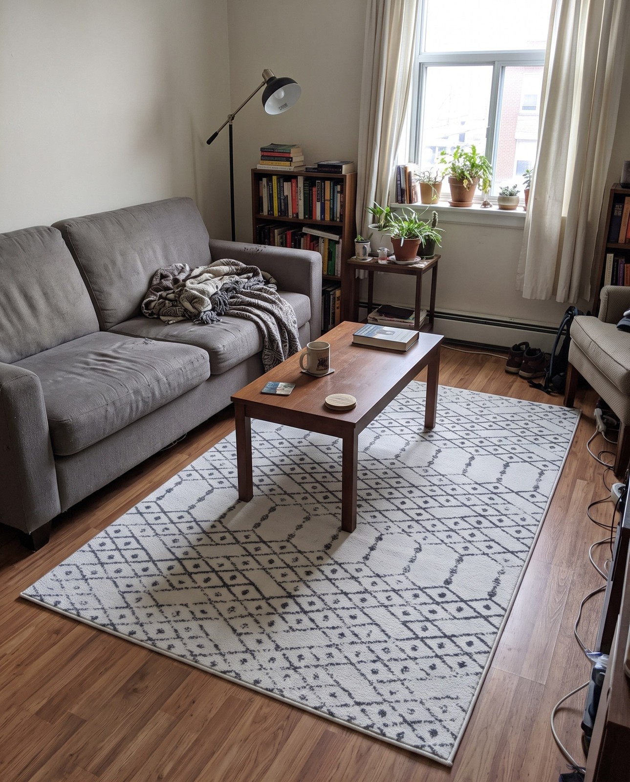 10' x 13' Newcomb · Geometric lattice rug, ivory and charcoal