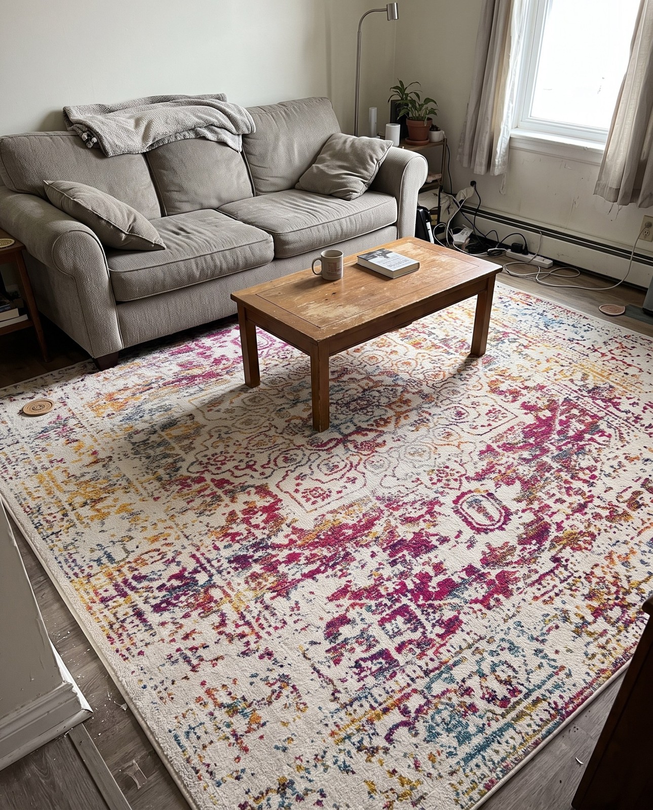 Detail image of 10' x 13' Birch · Distressed medallion rug, ivory and multi