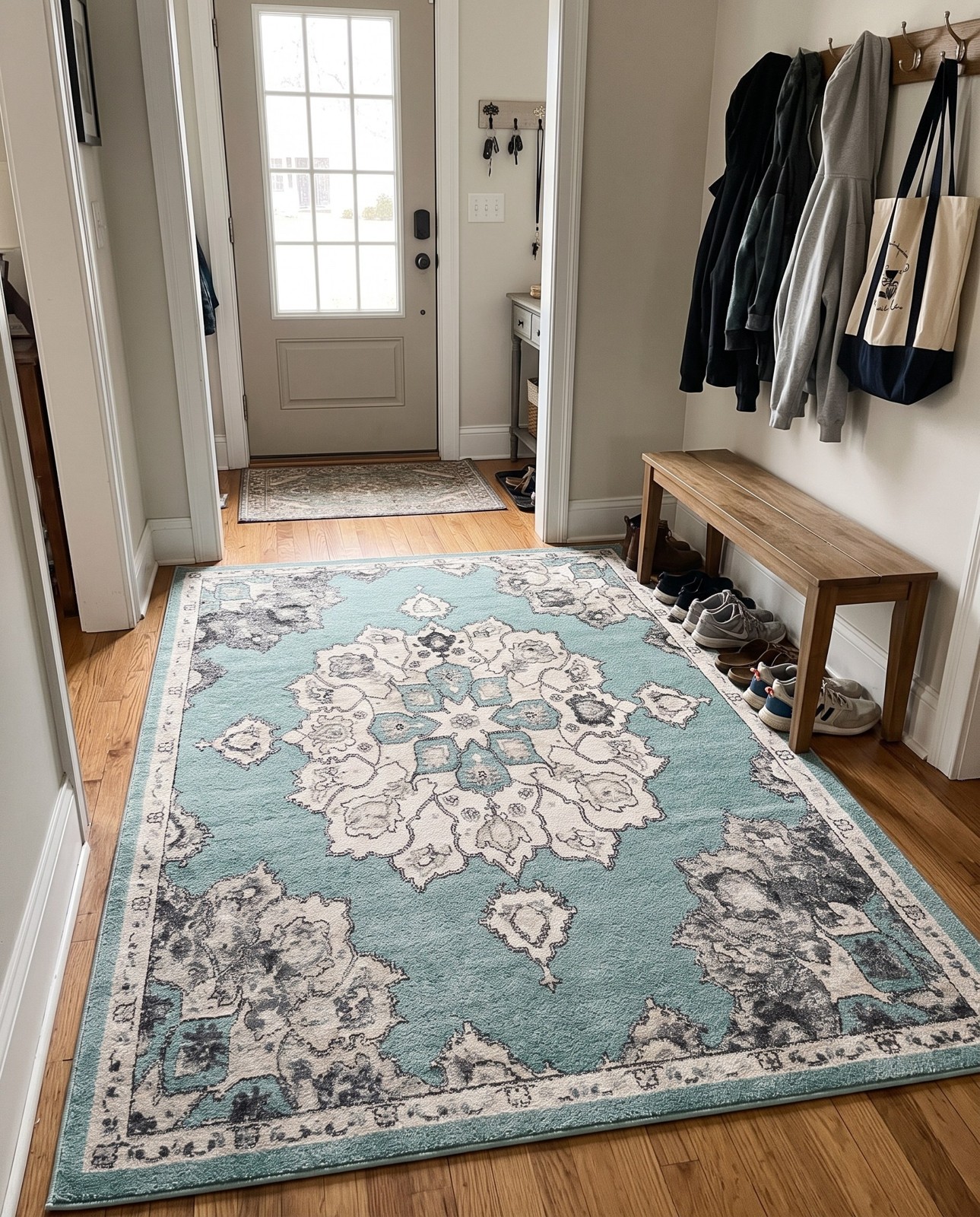 6' x 9' Nettle · Border rug, aqua