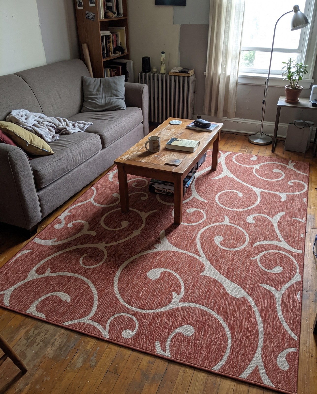 7' 10 x 11' Shale · Scrollwork Outdoor Rug, rust and light gray