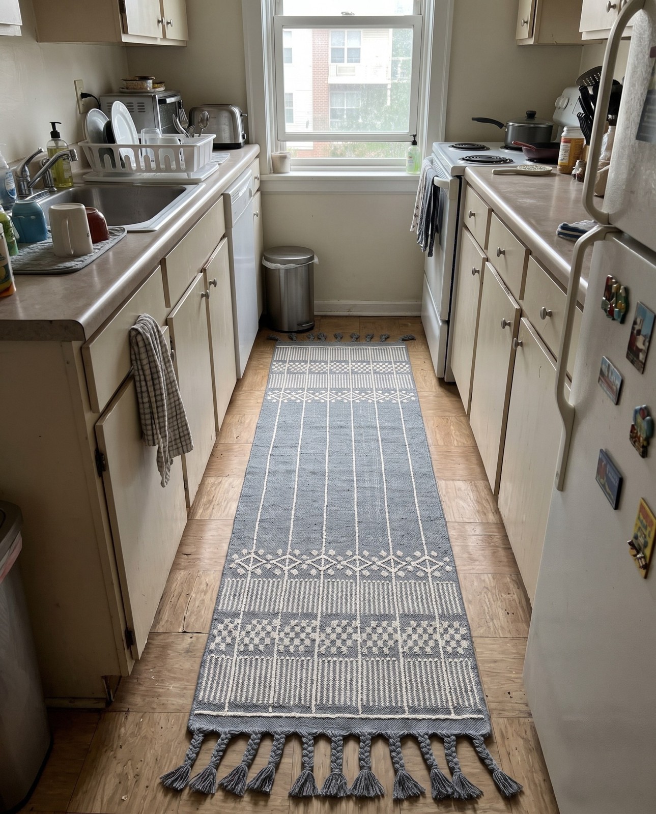 2' 2 x 6' 7 Beaumont · Geometric striped Outdoor Rug, gray and ivory