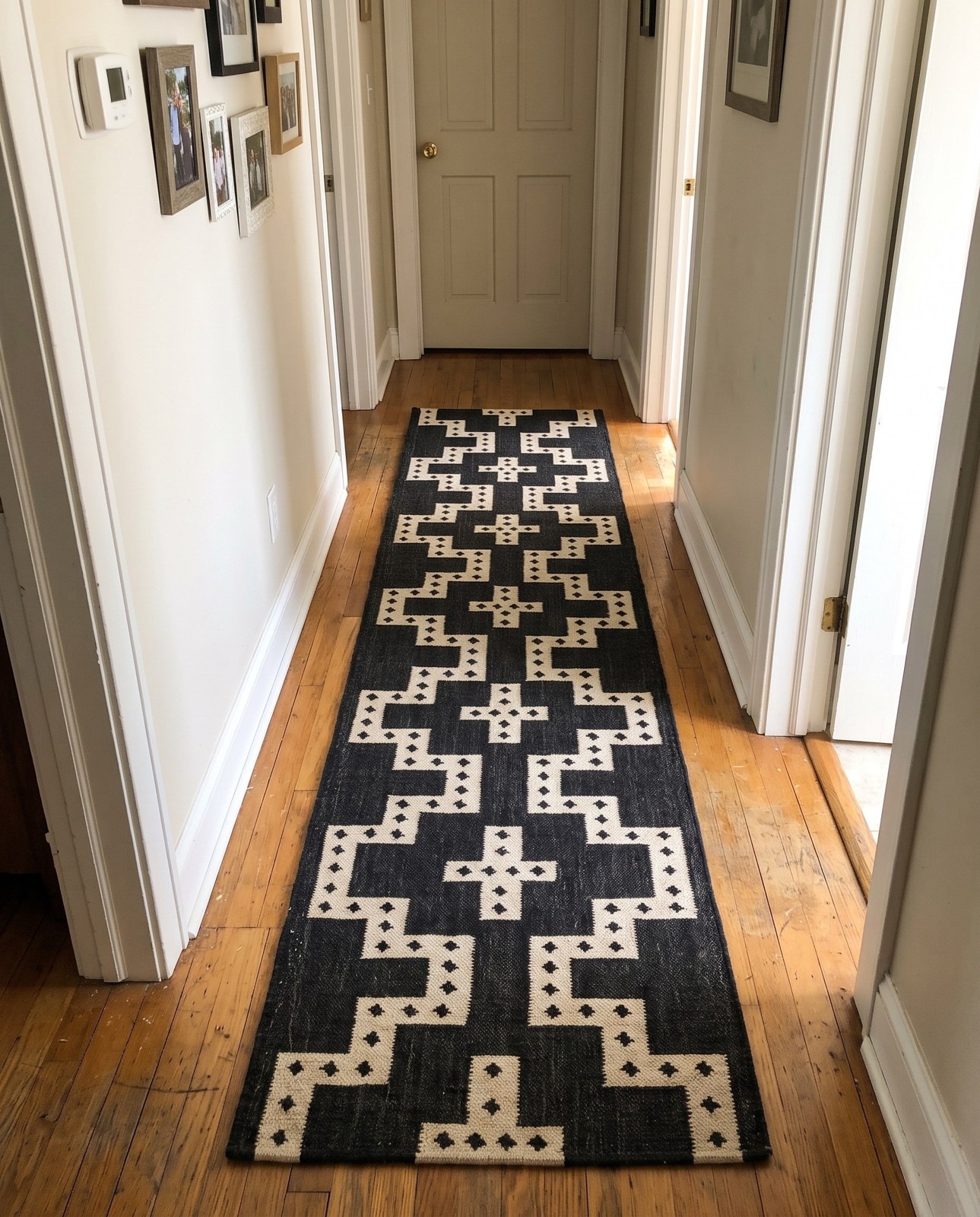2' 7 x 12' Earley · Geometric Wool Rug, black and ivory