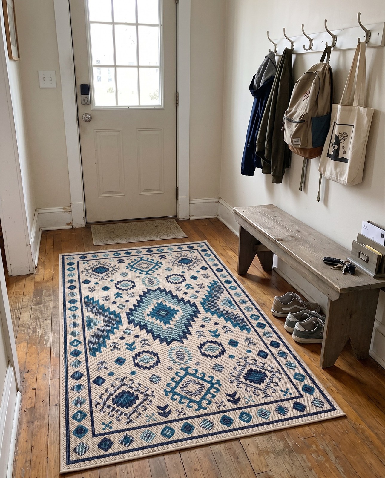 2' x 3' Whitfield · Geometric tribal Outdoor Rug, beige and blue