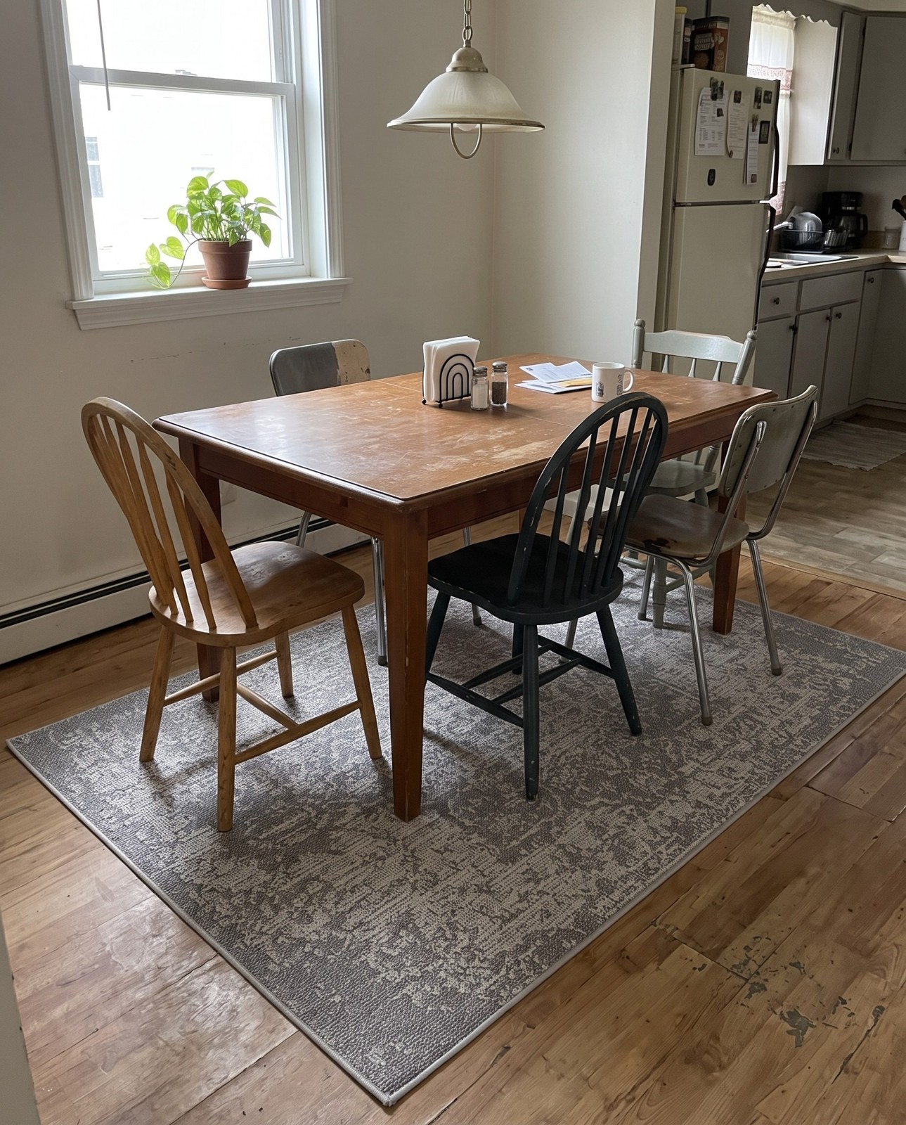 4' 1 x 6' 1 Cotter · Faded medallion Outdoor Rug, gray and cream