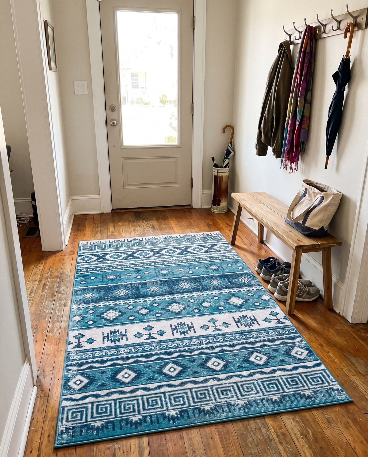 5' 3 x 8' Lloyd · Tribal striped rug, blue and ivory