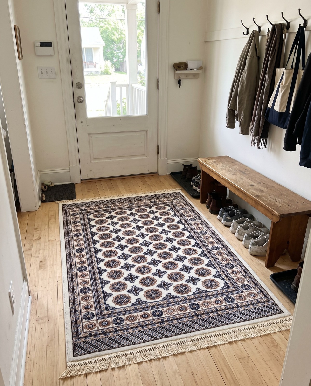 3' x 5' 3 Pitcairn · Geometric medallion rug, ivory and navy