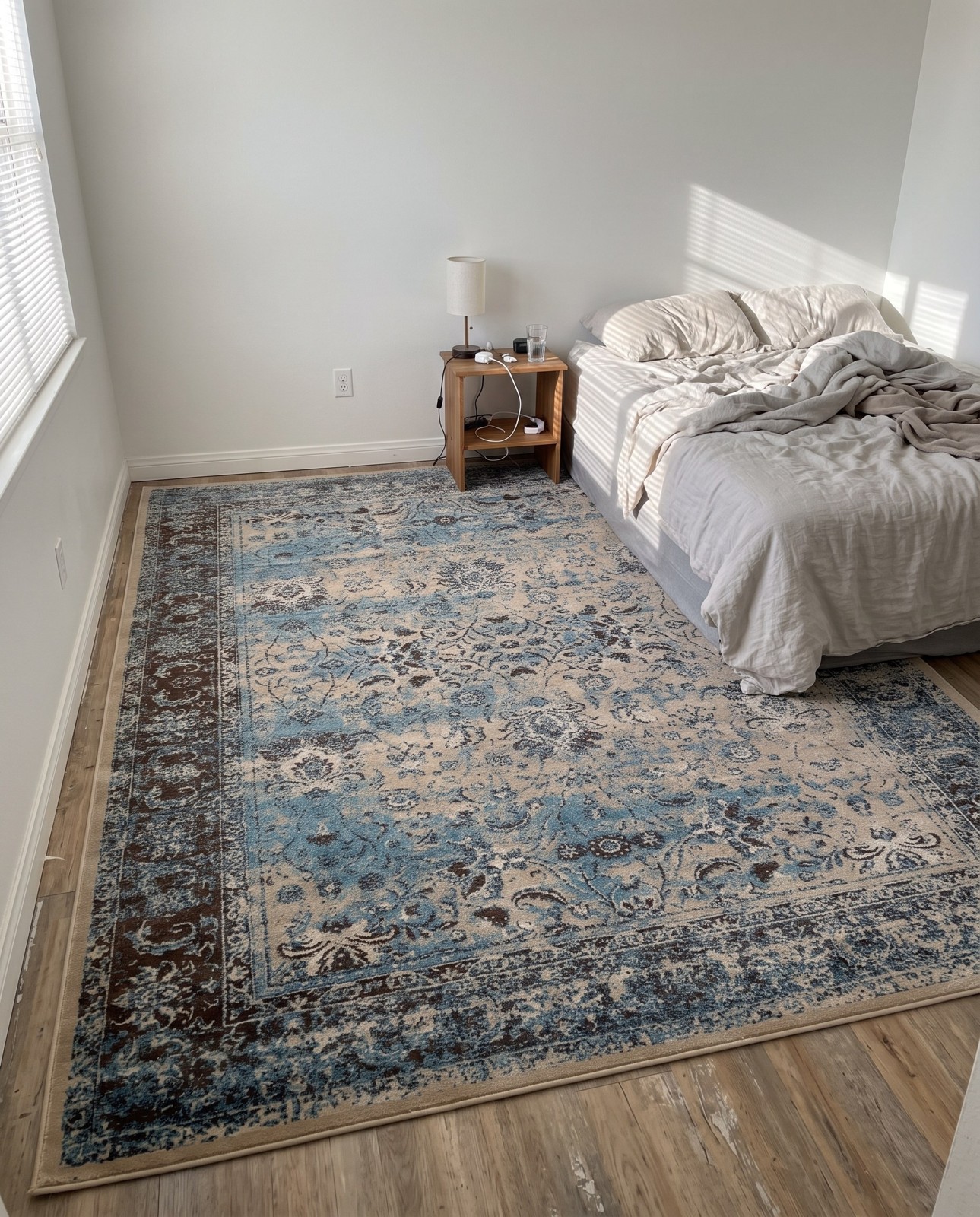 10' x 13' Harley · Distressed medallion rug, blue and brown