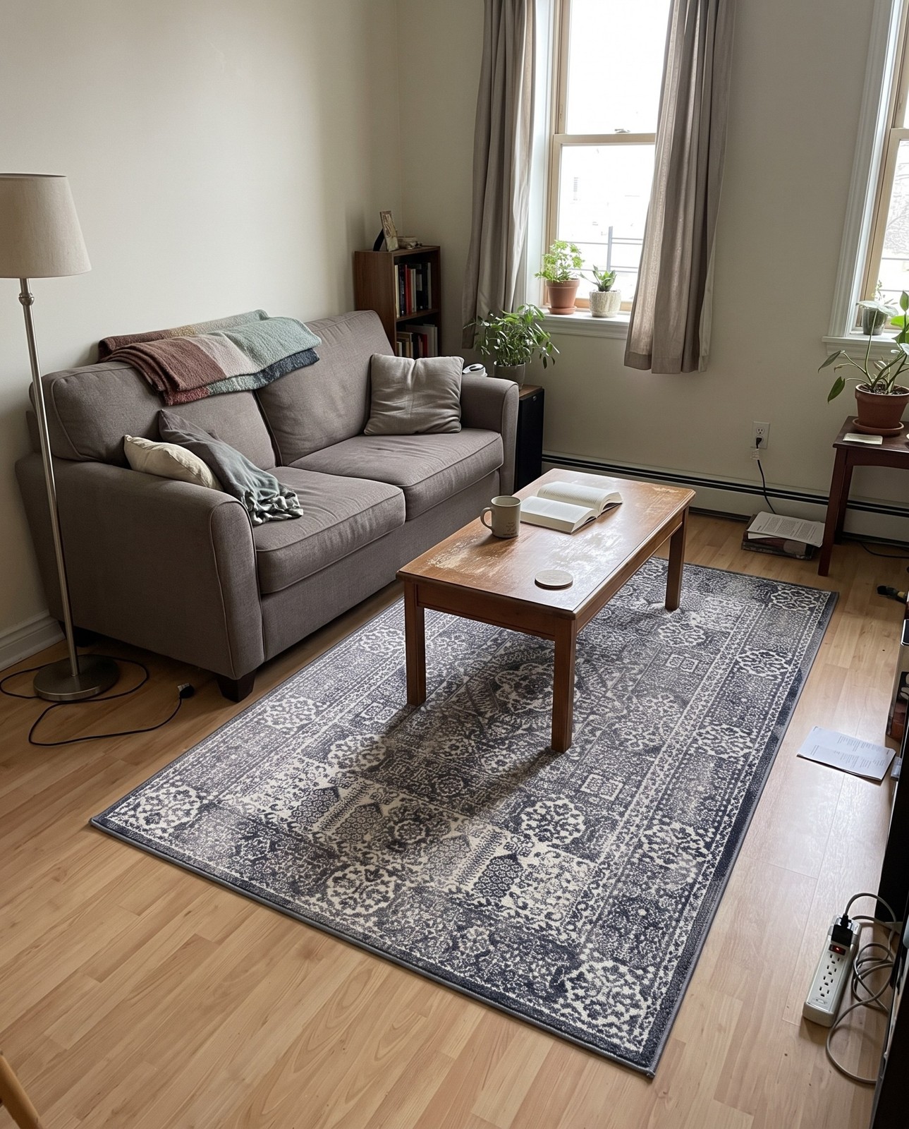 Detail image of 2' 2 x 3' Beaman · Distressed medallion rug, gray and ivory