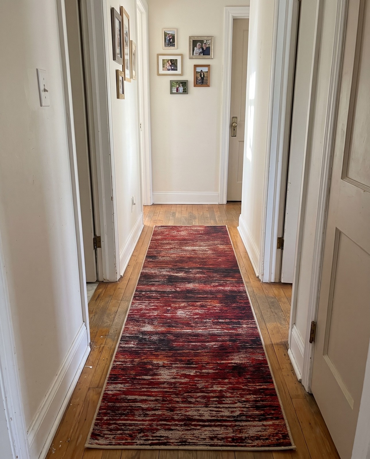 2' 6 x 12' Prewitt · Abstract rug, rust red