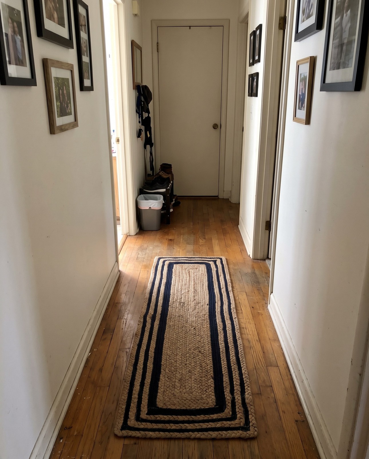 Detail image of 0' 9 x 2' 6 Healy · Striped Braided Jute Rug, navy