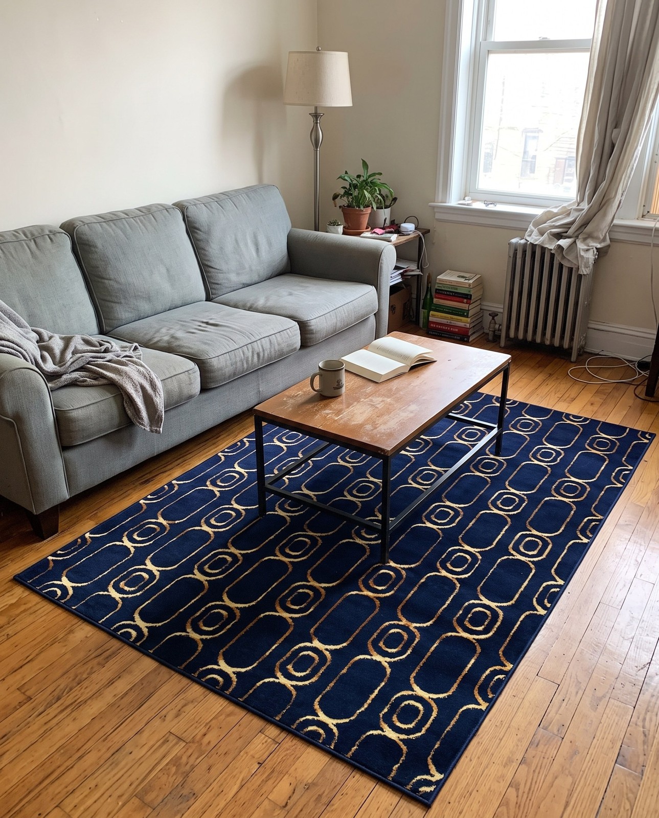 Detail image of 4' x 6' Renwick · Geometric rug, navy blue and gold
