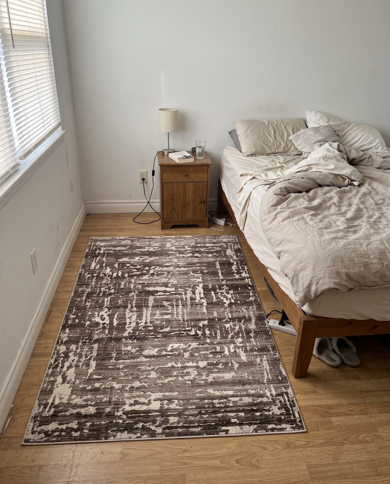 Detail image of 5' 3 x 8' Wrenfield · Abstract rug, chocolate and beige