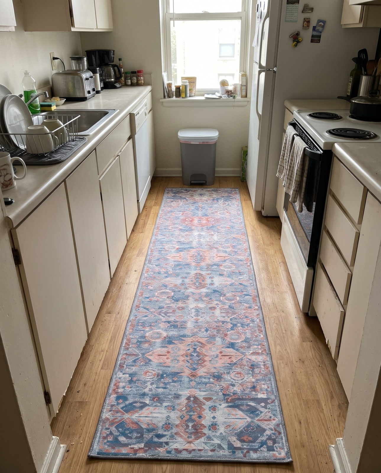 2' 6 x 12' Waters · Geometric medallion Washable Rug, blue and rust