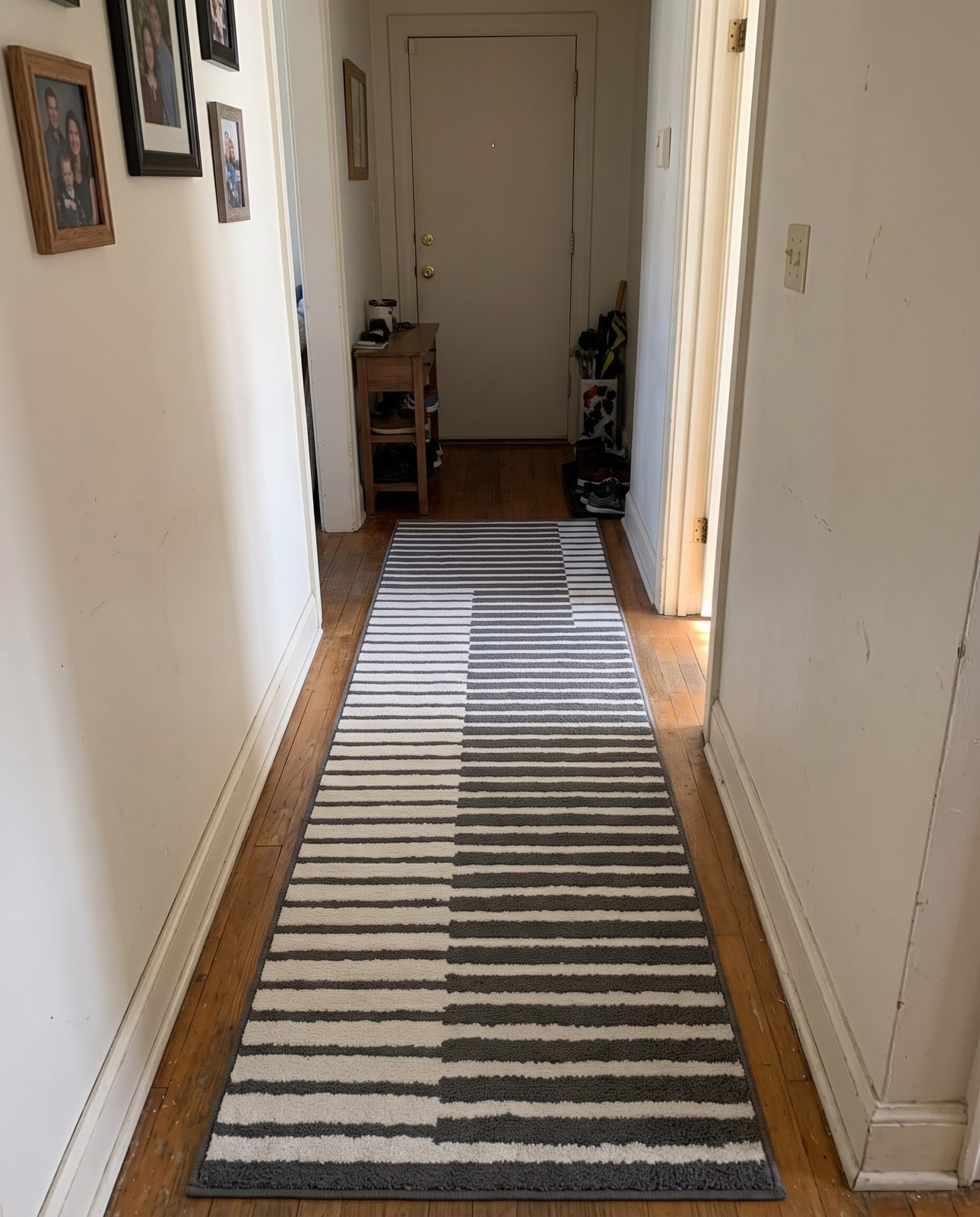 2' 7 x 10' Crossing · Striped geometric rug, gray and ivory