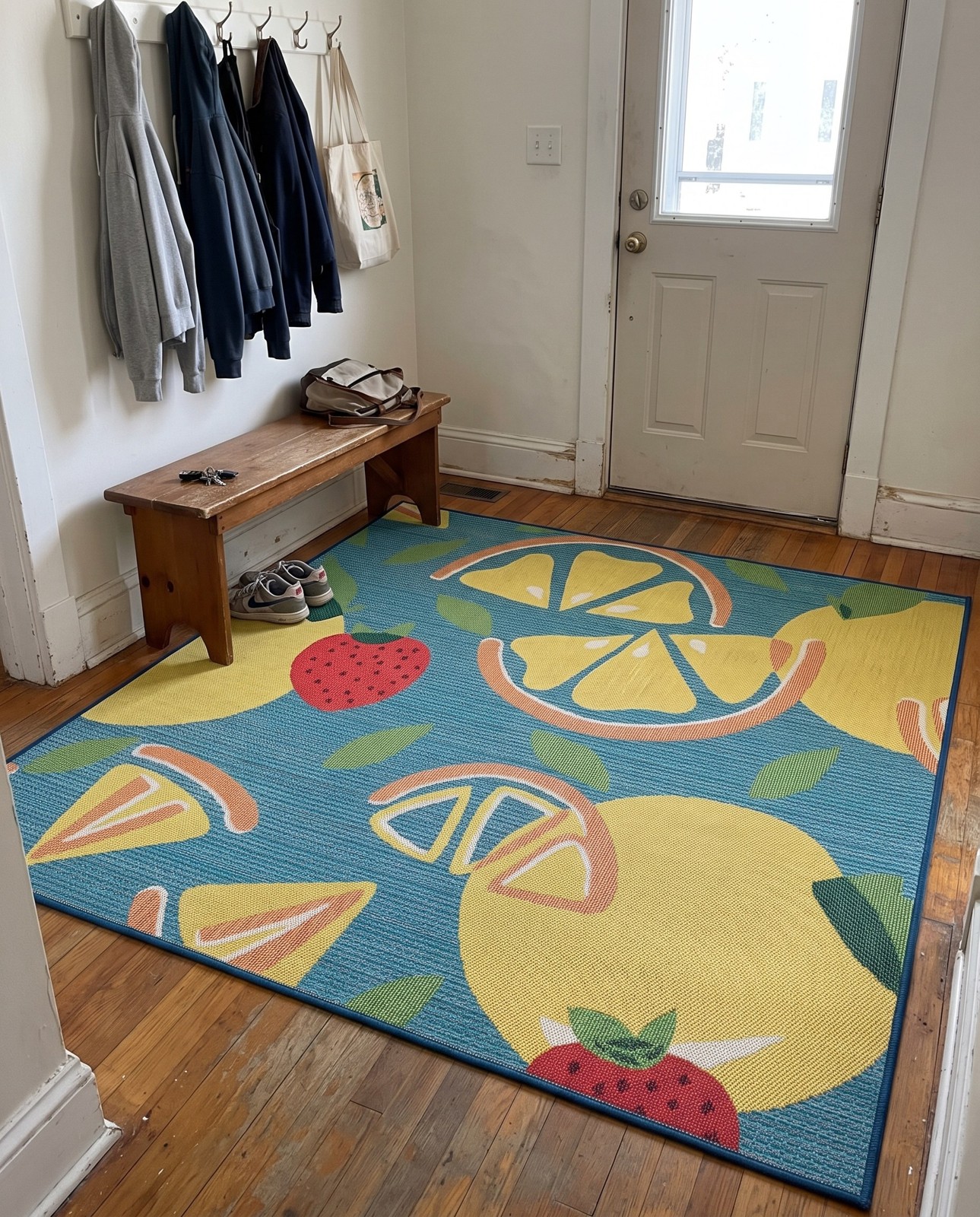 10' x 10' Masterson · Citrus fruit Outdoor Rug, blue and yellow