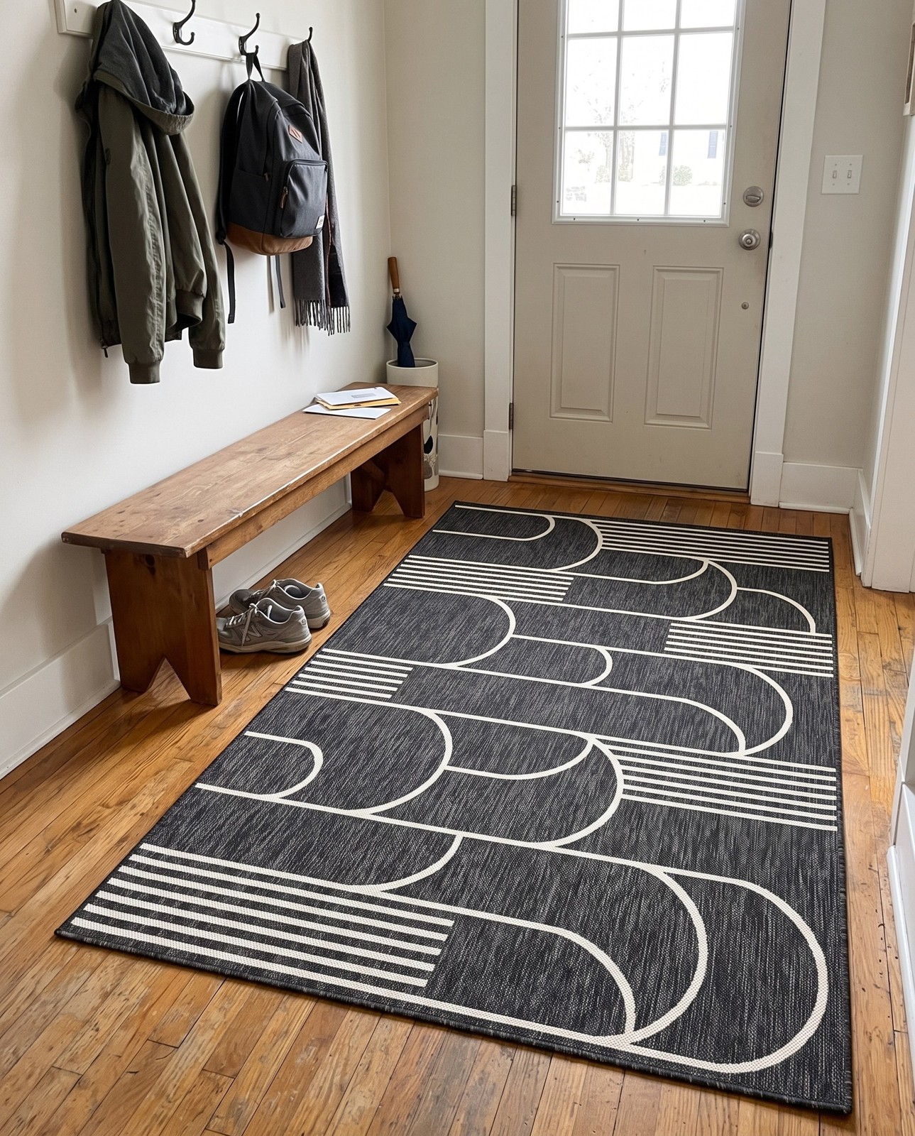 Detail image of 5' 3 x 8' Prudence · Geometric Outdoor Rug, black and white