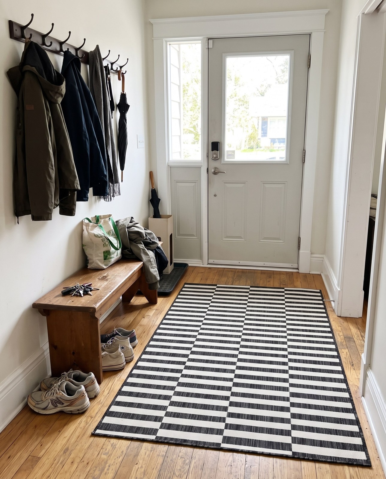 2' x 3' Ainsley · Striped geometric Outdoor Rug, charcoal and ivory