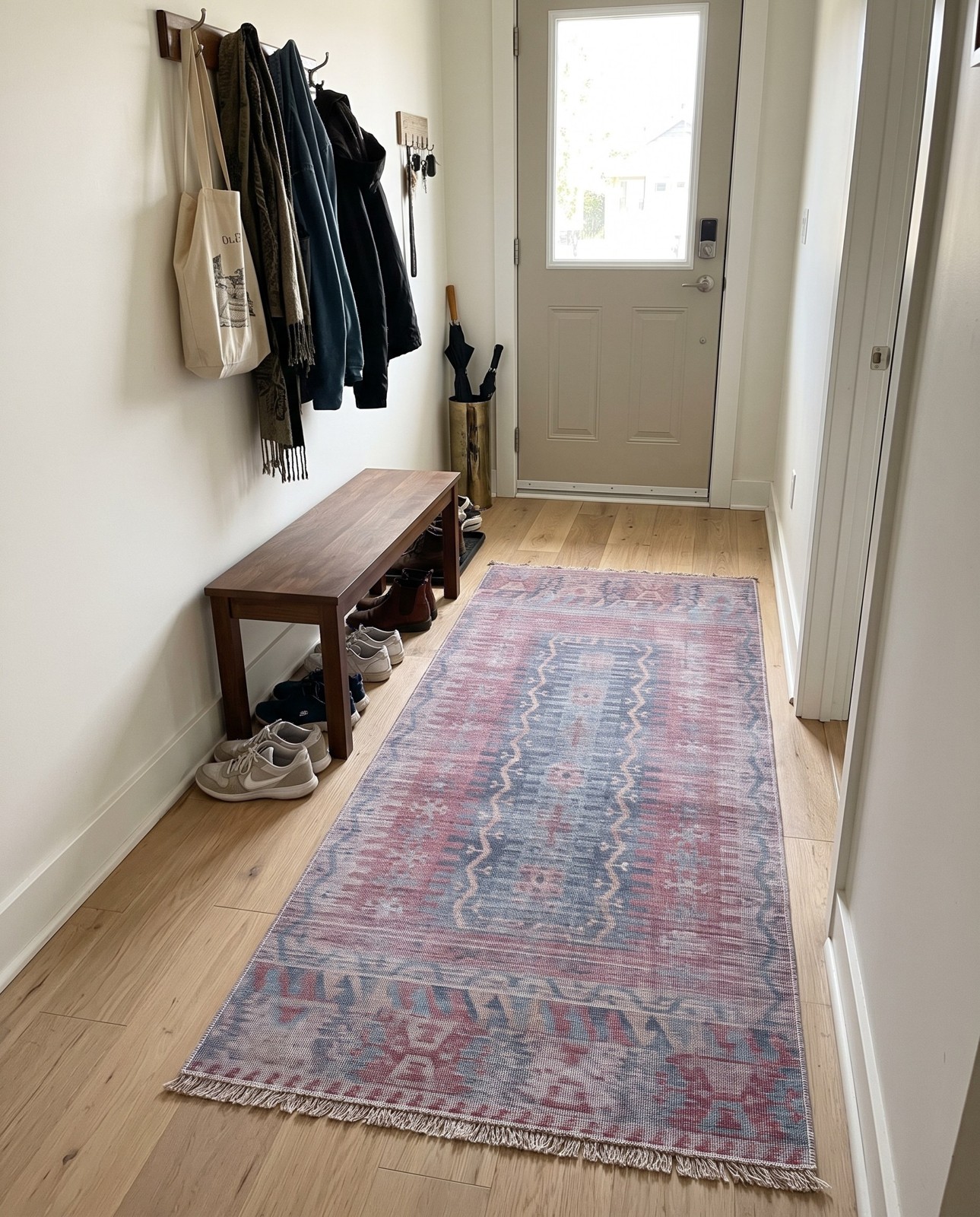 10' 6 x 13' Paige · Tribal geometric Washable Rug, blue and red