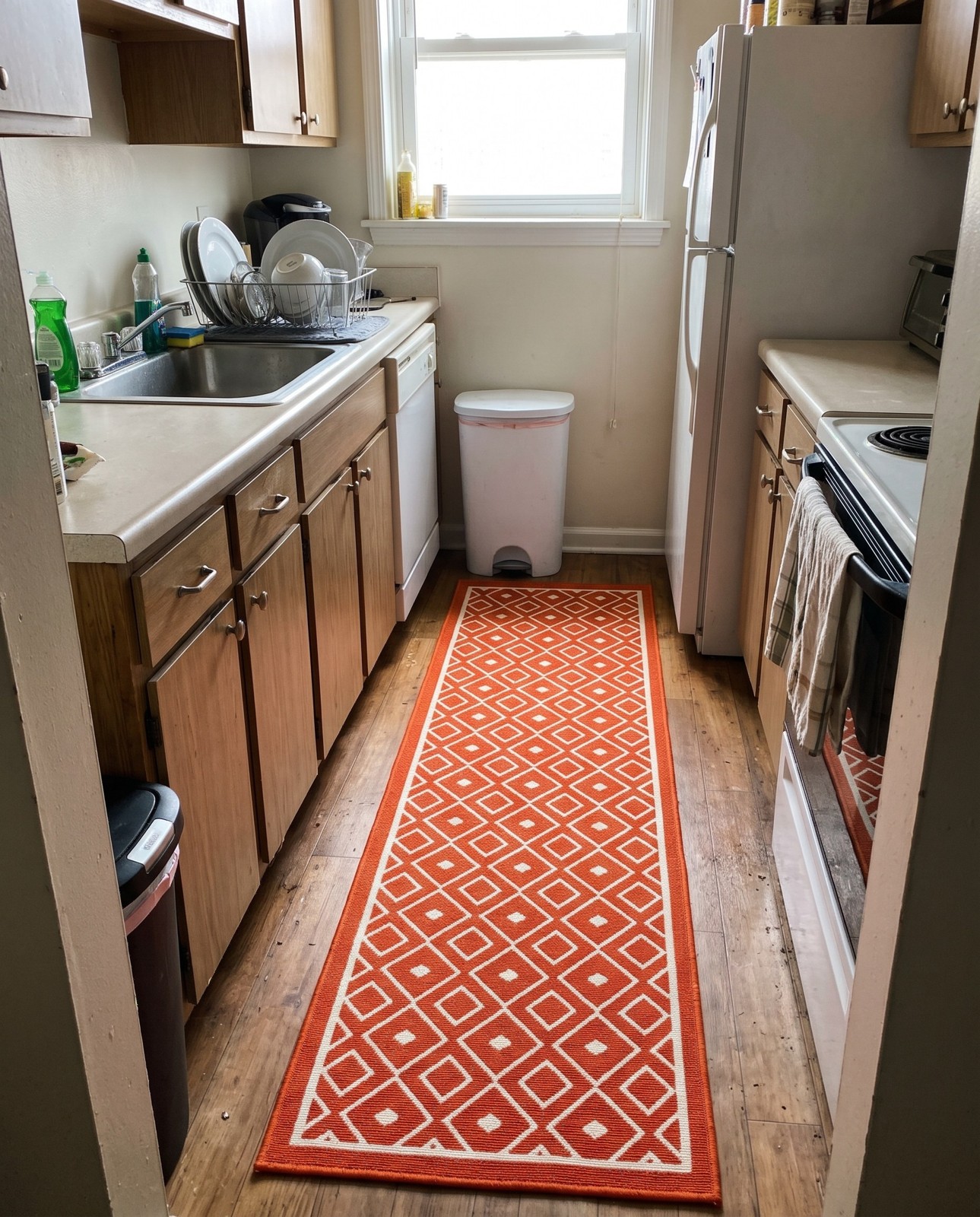 2' x 6' Revell · Geometric lattice Outdoor Rug, rust and ivory
