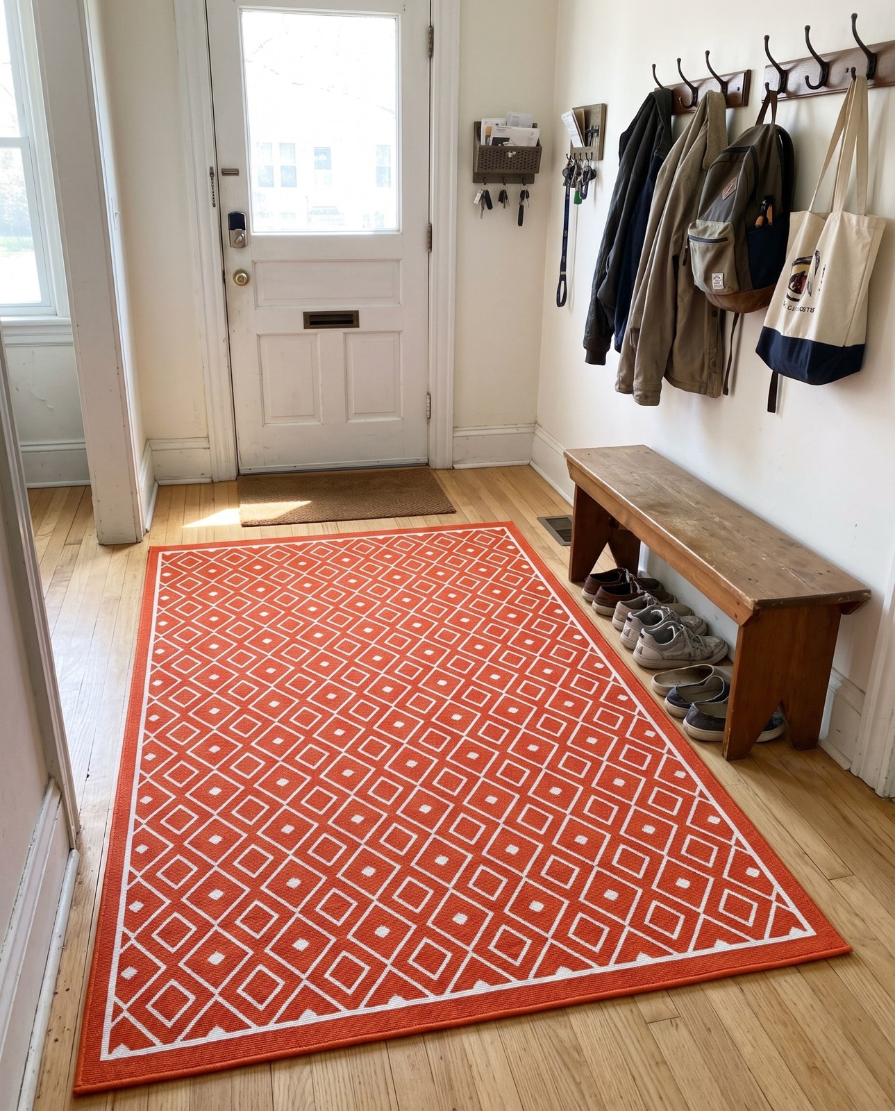 6' x 9' Revell · Geometric lattice Outdoor Rug, rust and ivory