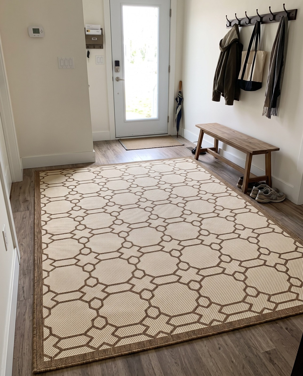 8' x 11' 4 Fanshawe · Border Outdoor Rug