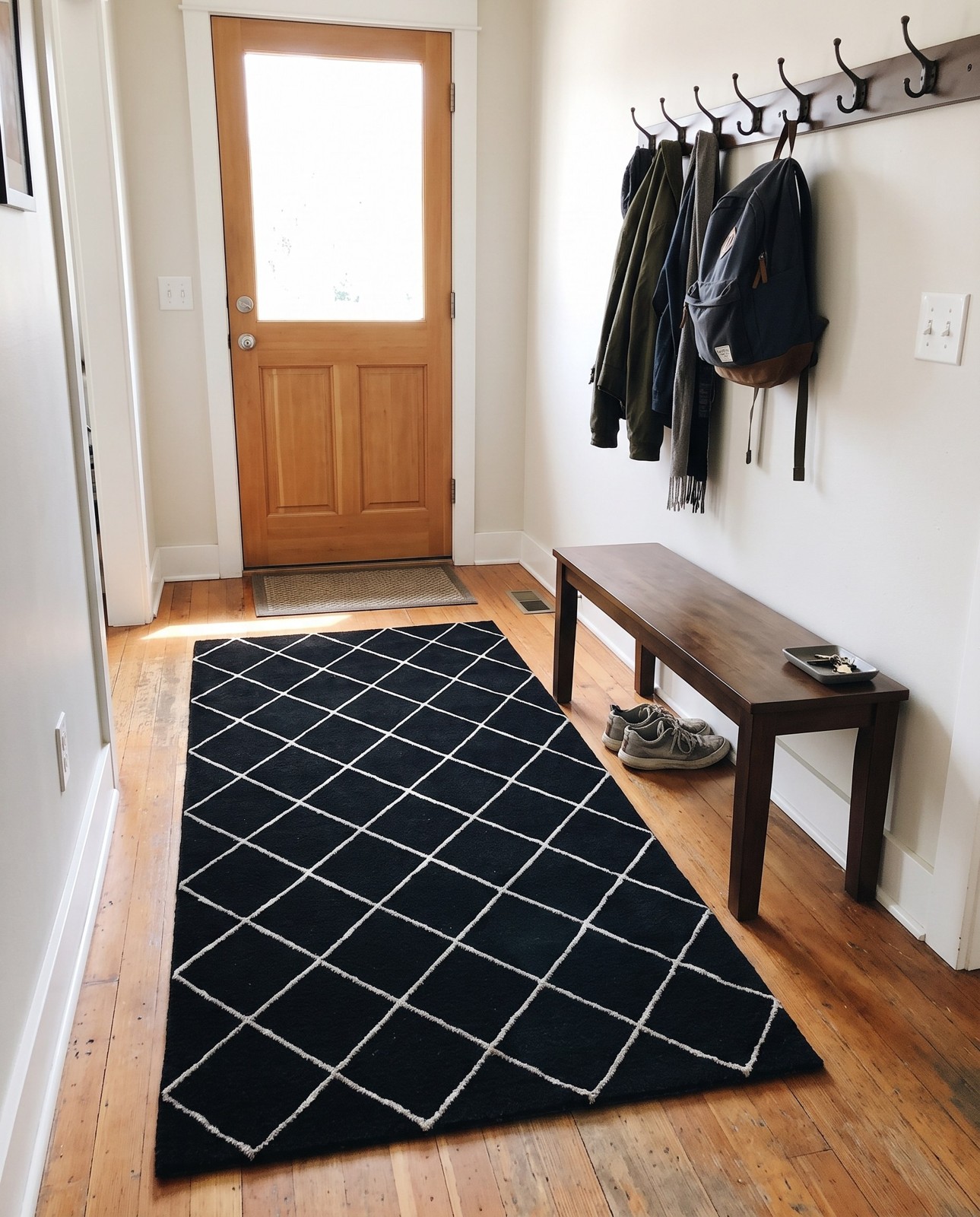 Detail image of 4' x 6' Gilchrist · Diamond rug, black and silver