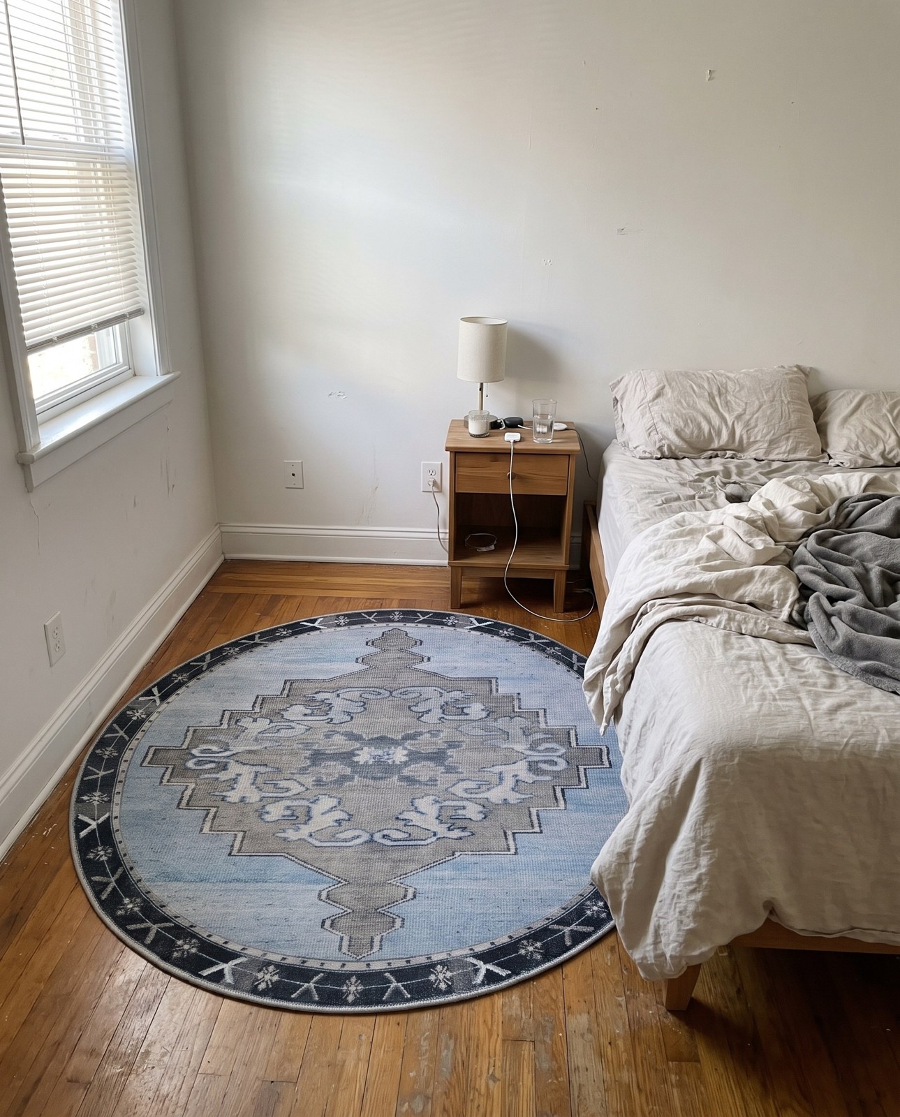 Detail image of 7' 7 x 7' 7 Sanderson · Medallion Washable Rug, blue and gray