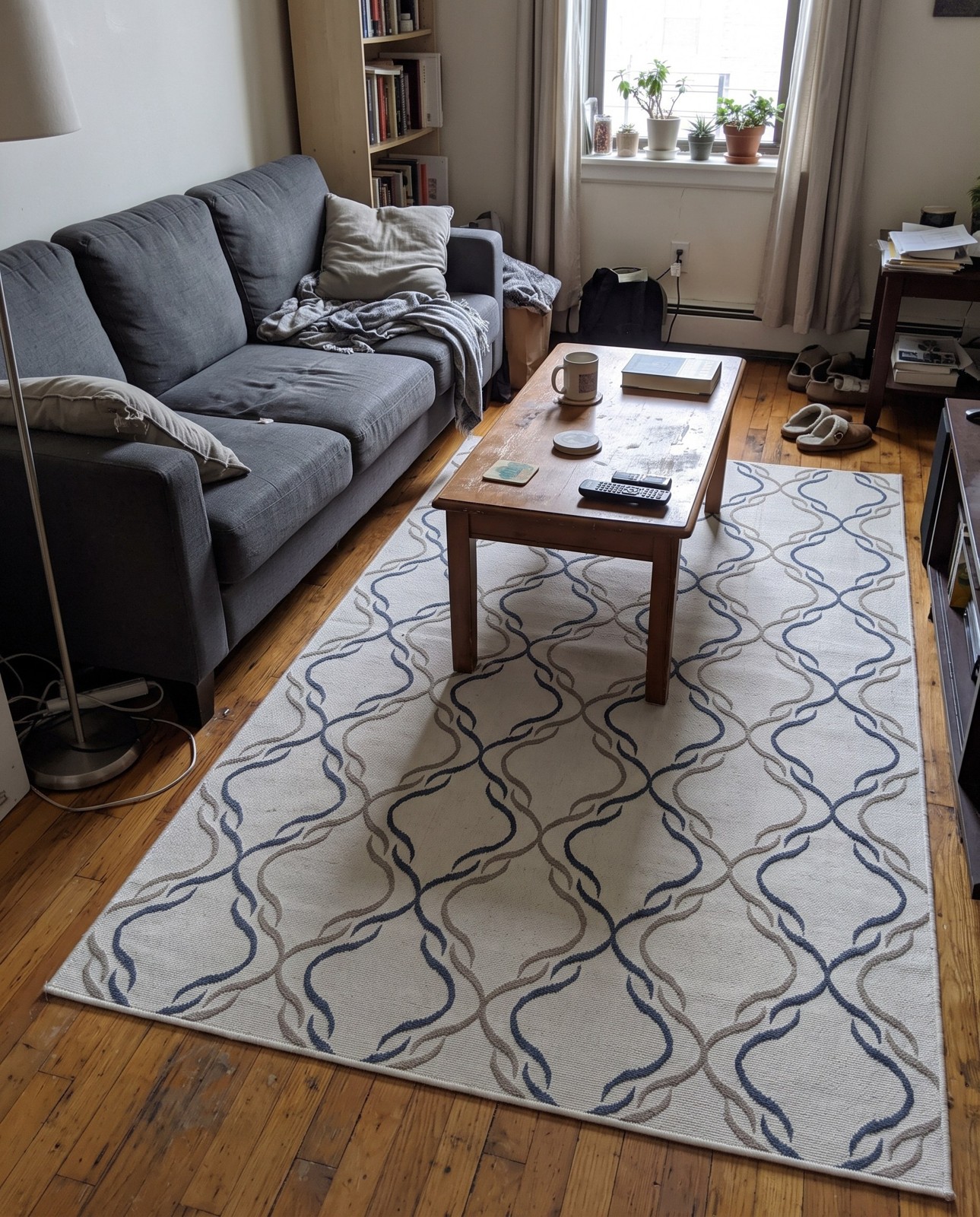 5' 3 x 8' Comstock · Lattice Outdoor Rug, ivory, blue, and gray
