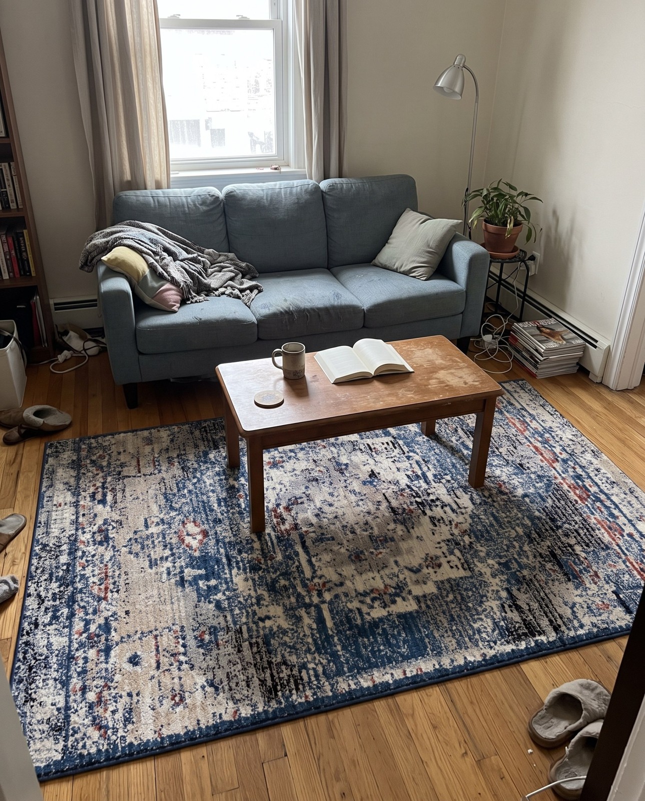 5' x 8' Burton · Distressed medallion rug, blue and beige