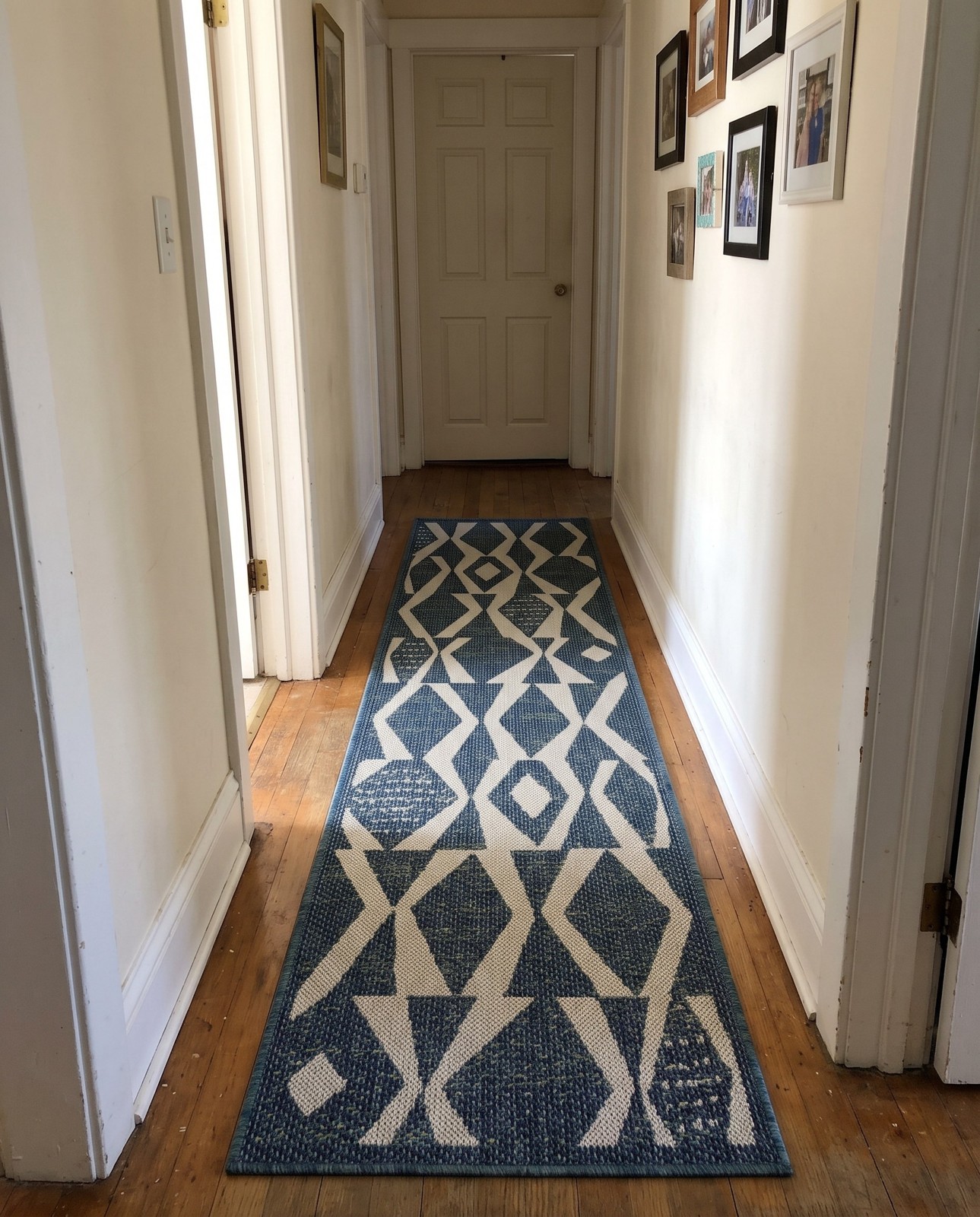 Detail image of 2' x 5' 1 Casper · Geometric diamond Outdoor Rug, blue and ivory