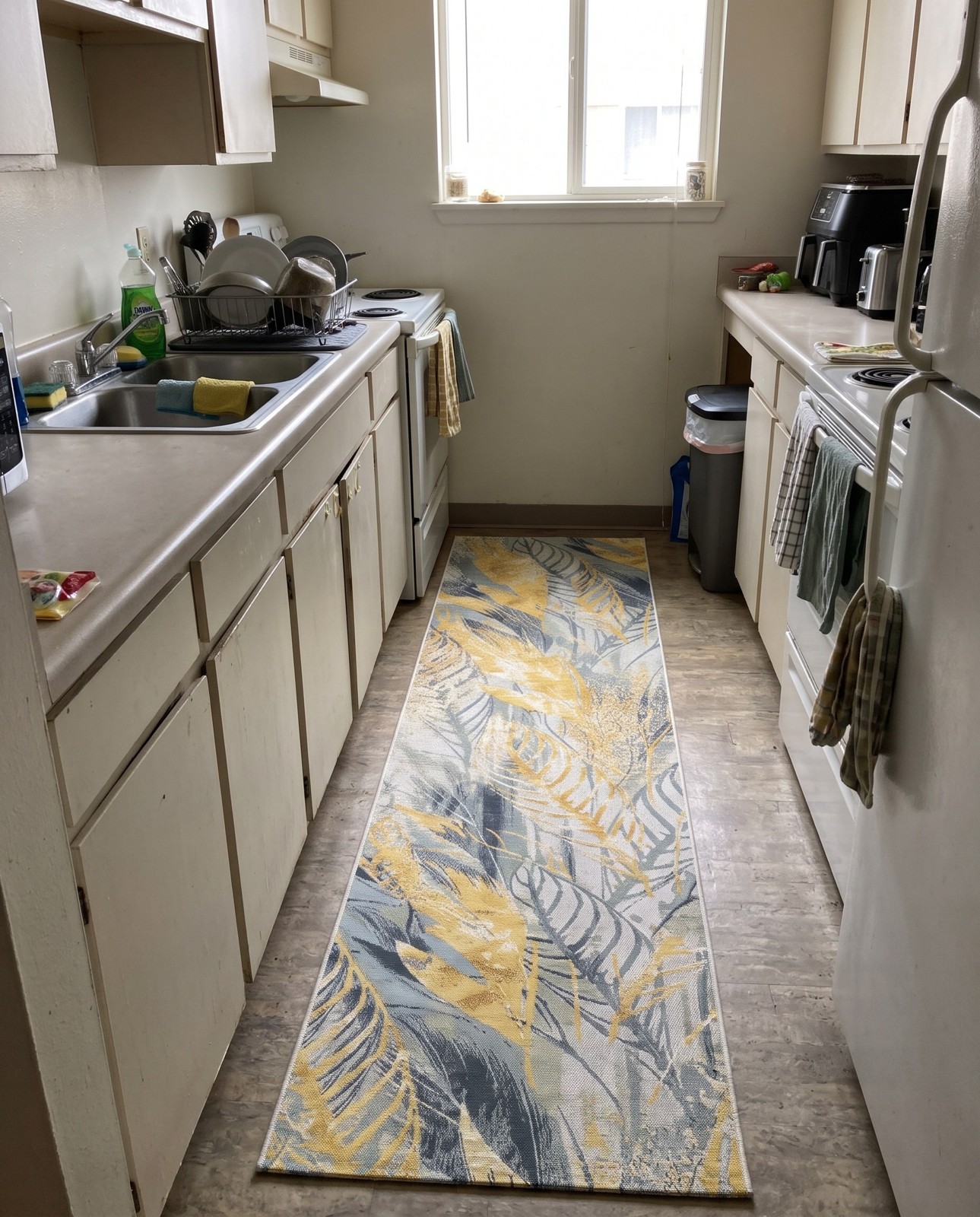 2' 7 x 10' Lomax · Botanical Outdoor Rug, yellow, gray and ivory
